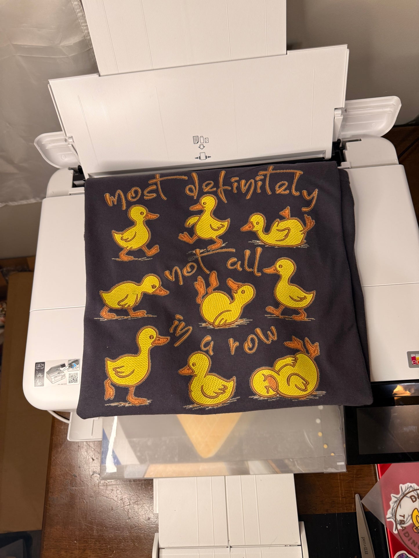 “Most Definitely Not All in a Row” Duck Tee